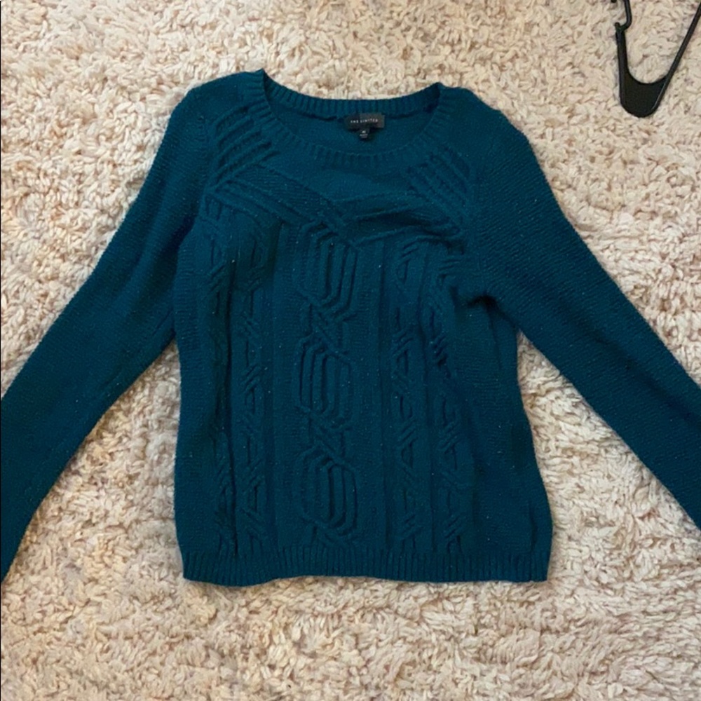 The limited XS teal sweater